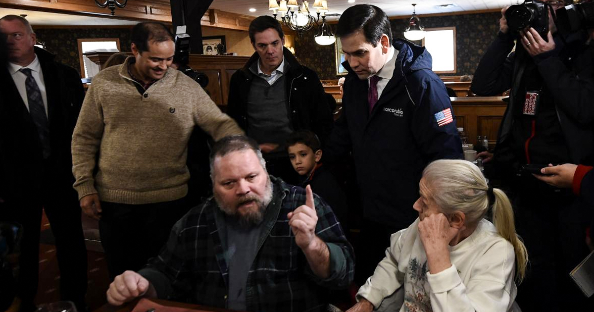 Watch Marco Rubio Run Away When Confronted by Gay Couple in a Diner – David Pakman Show