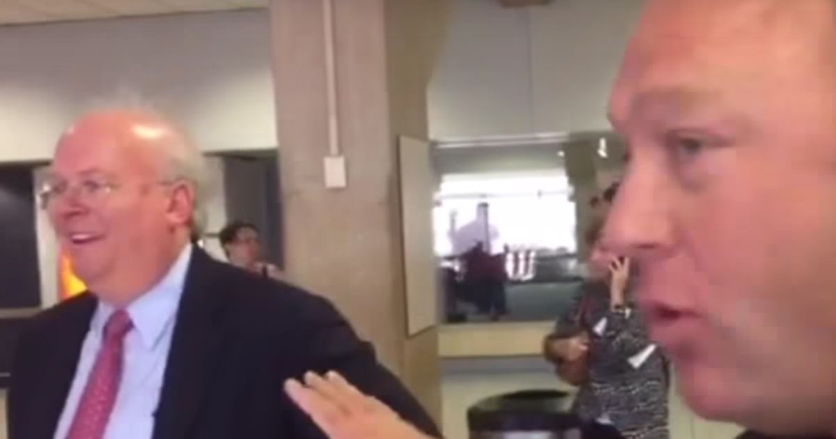 Watch Alex Jones and Karl Rove Engage In A Childish, Bickering Argument At Airport